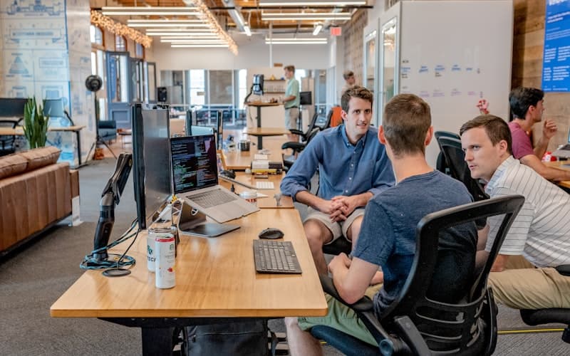 Team meeting discussing AI adoption strategy